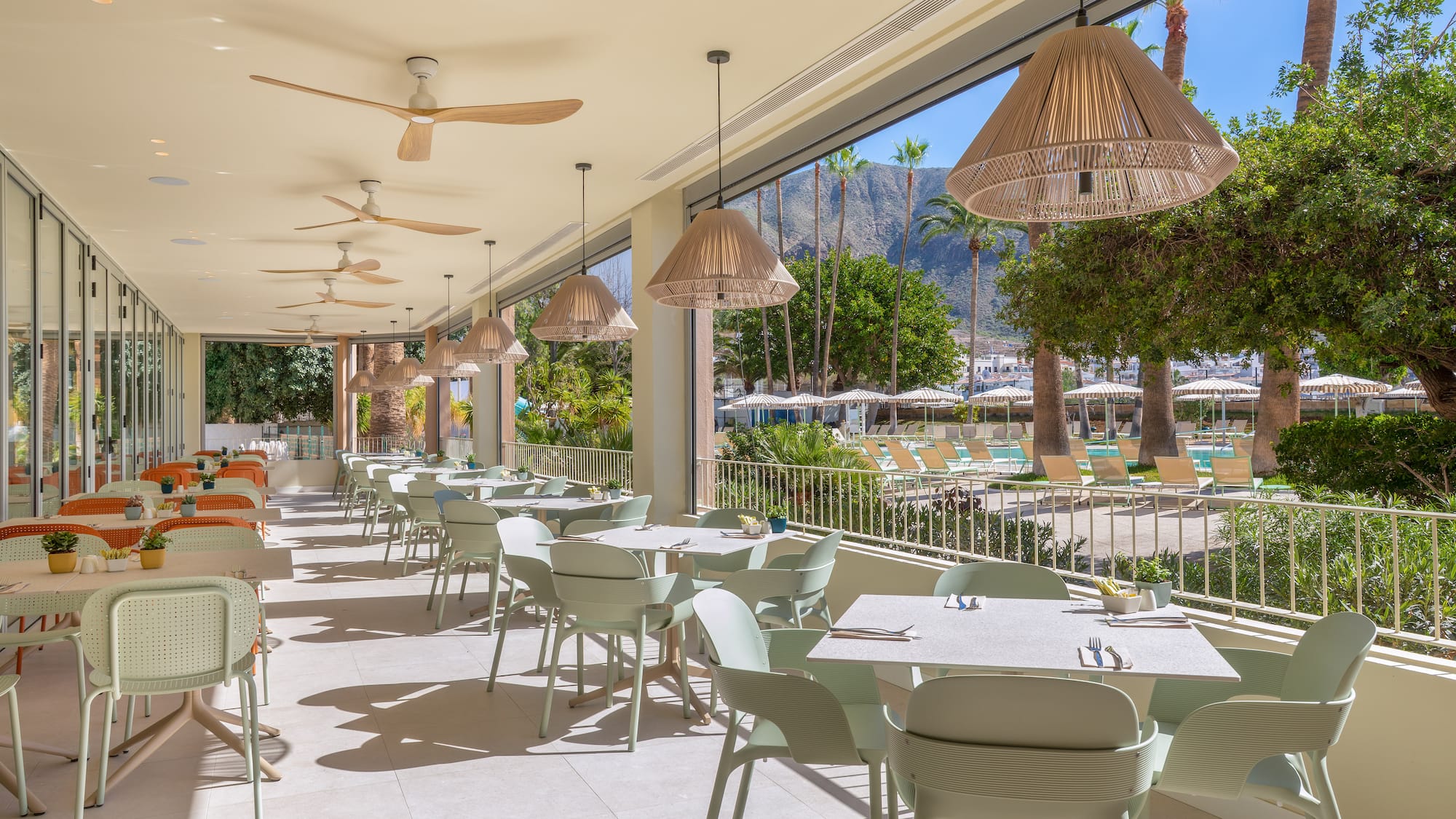 a restaurant with tables and chairs