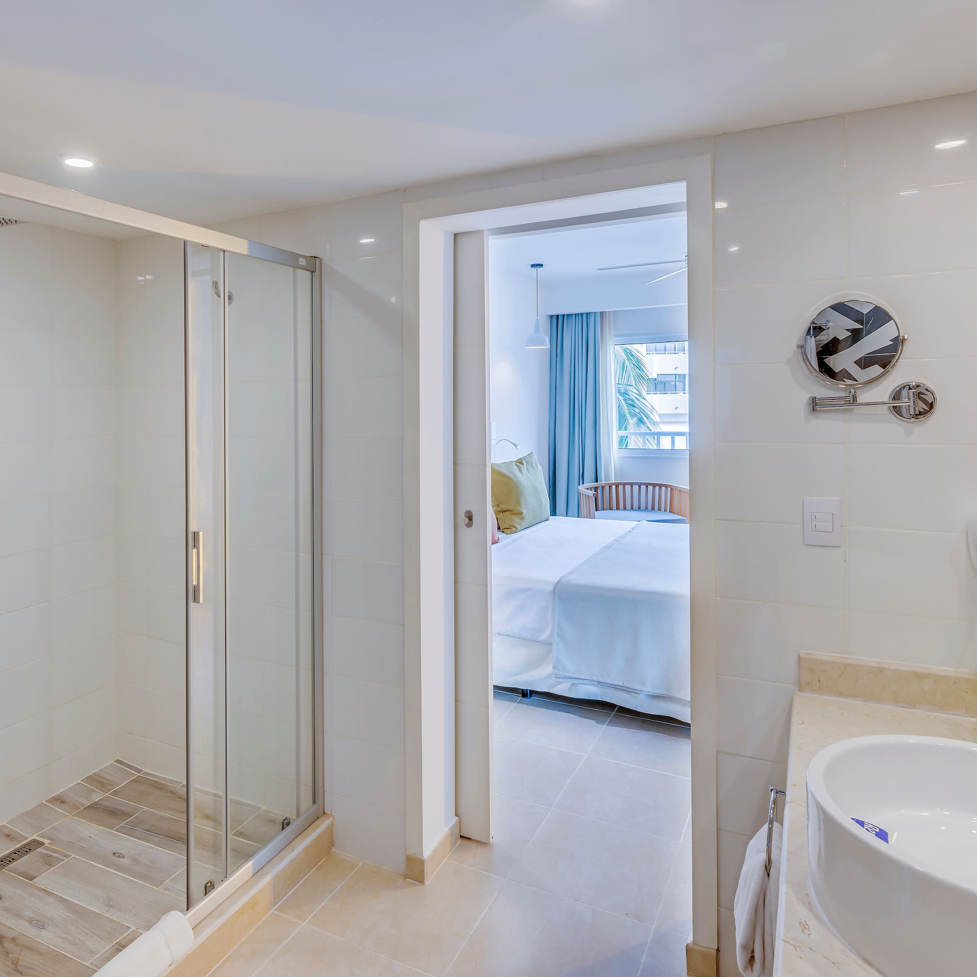 a bathroom with a shower and sink