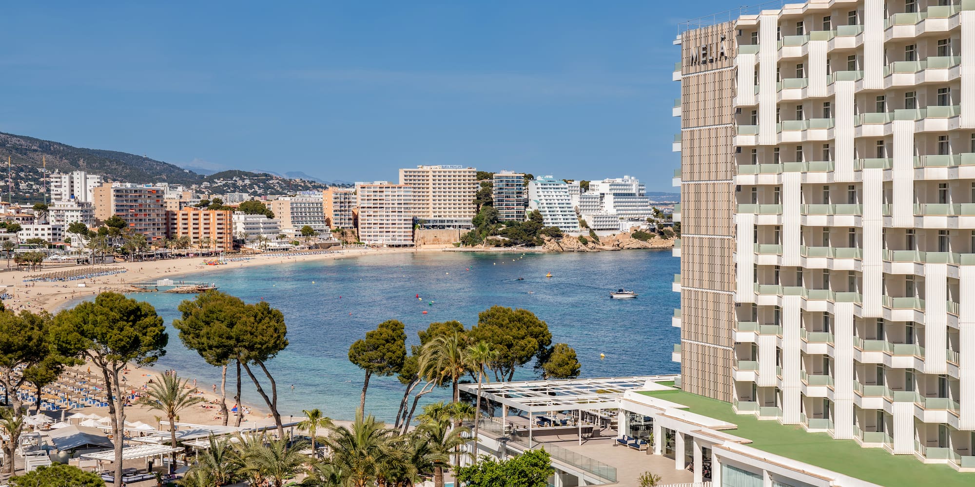 a building next to a body of water