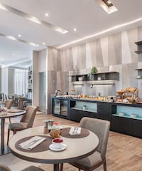 a room with tables and chairs