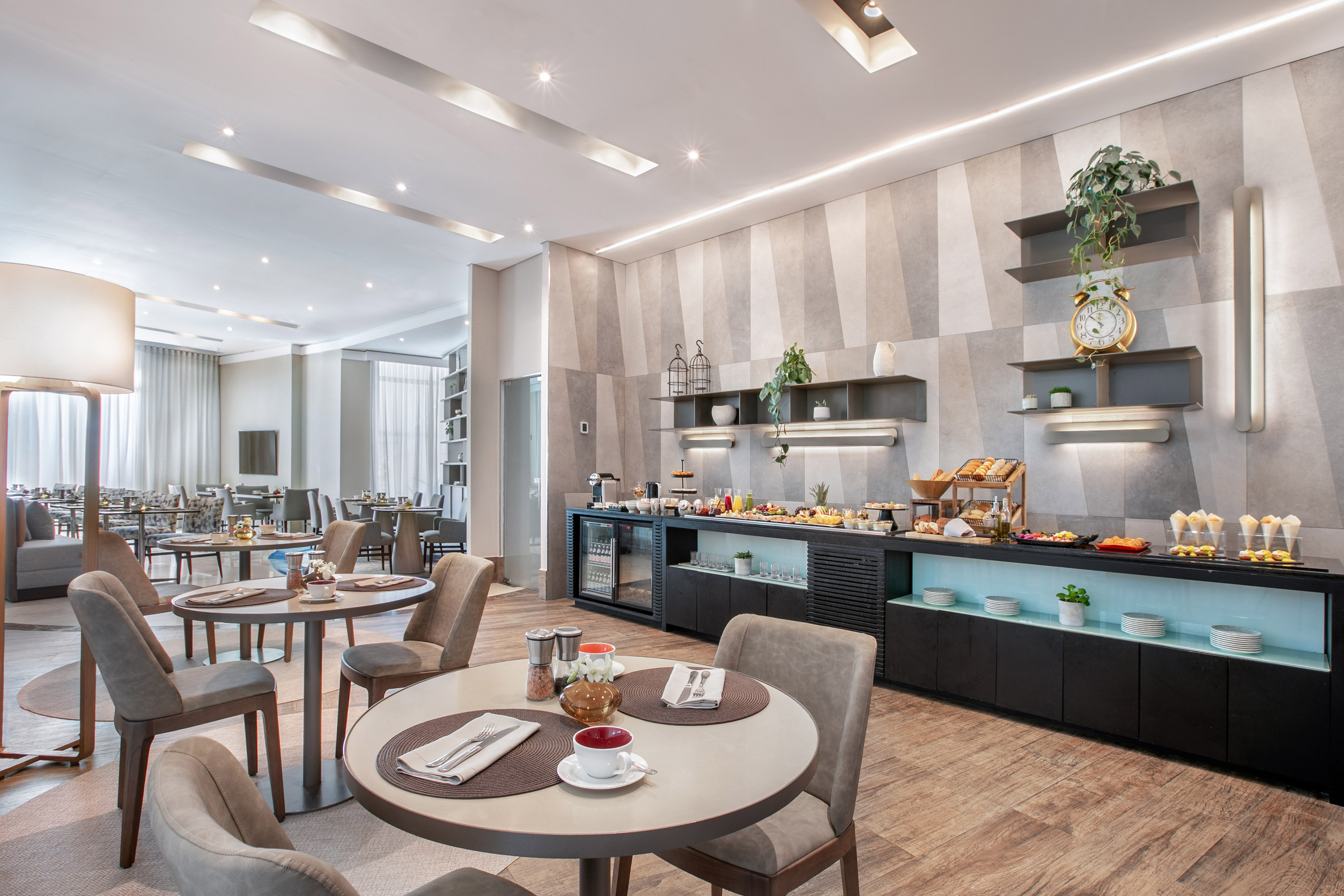 Modern hotel breakfast buffet in a contemporary restaurant.