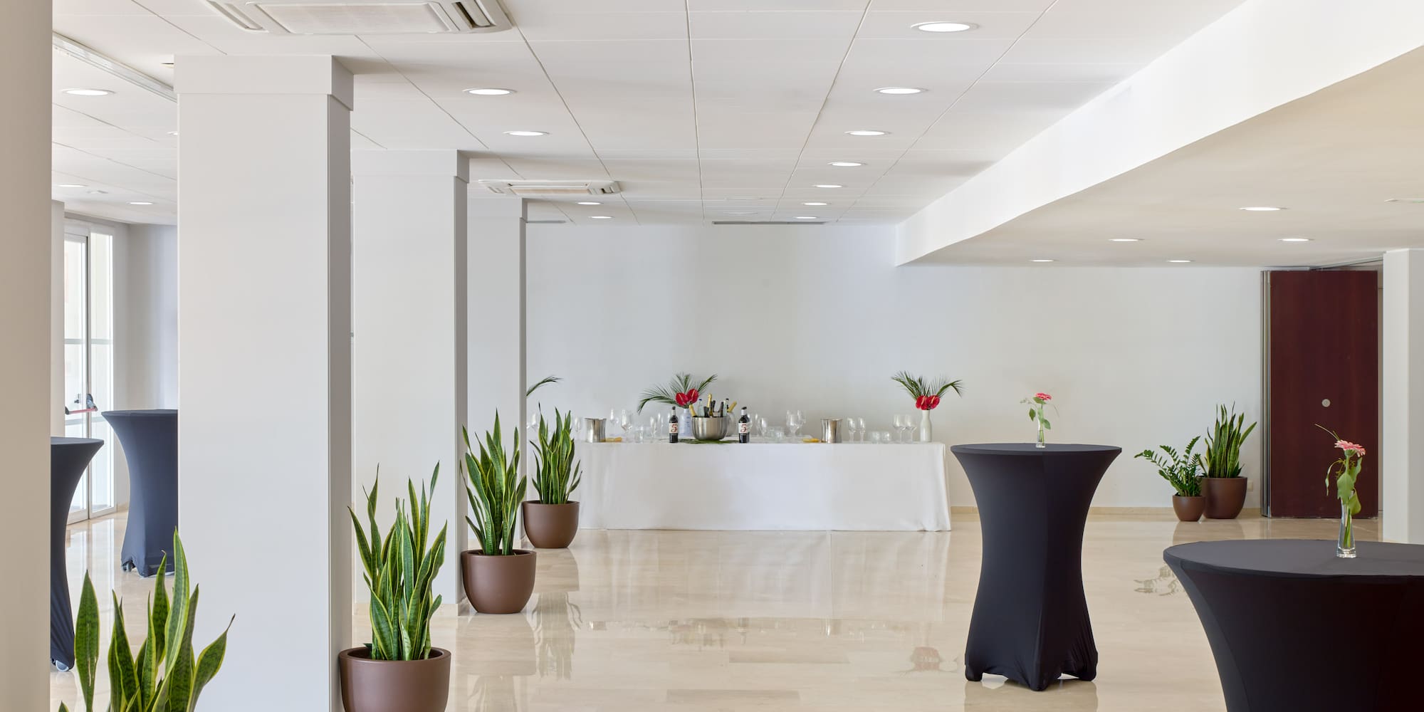 a room with a table and chairs