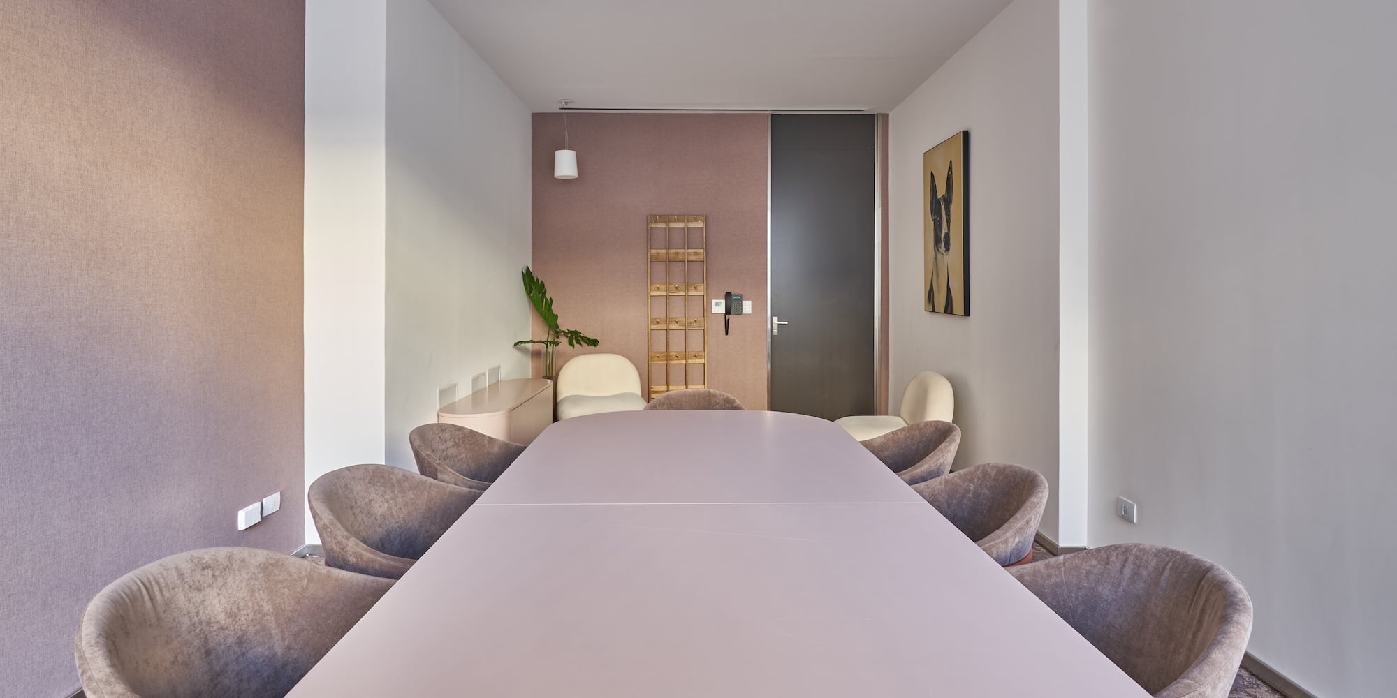 a room with a table and chairs