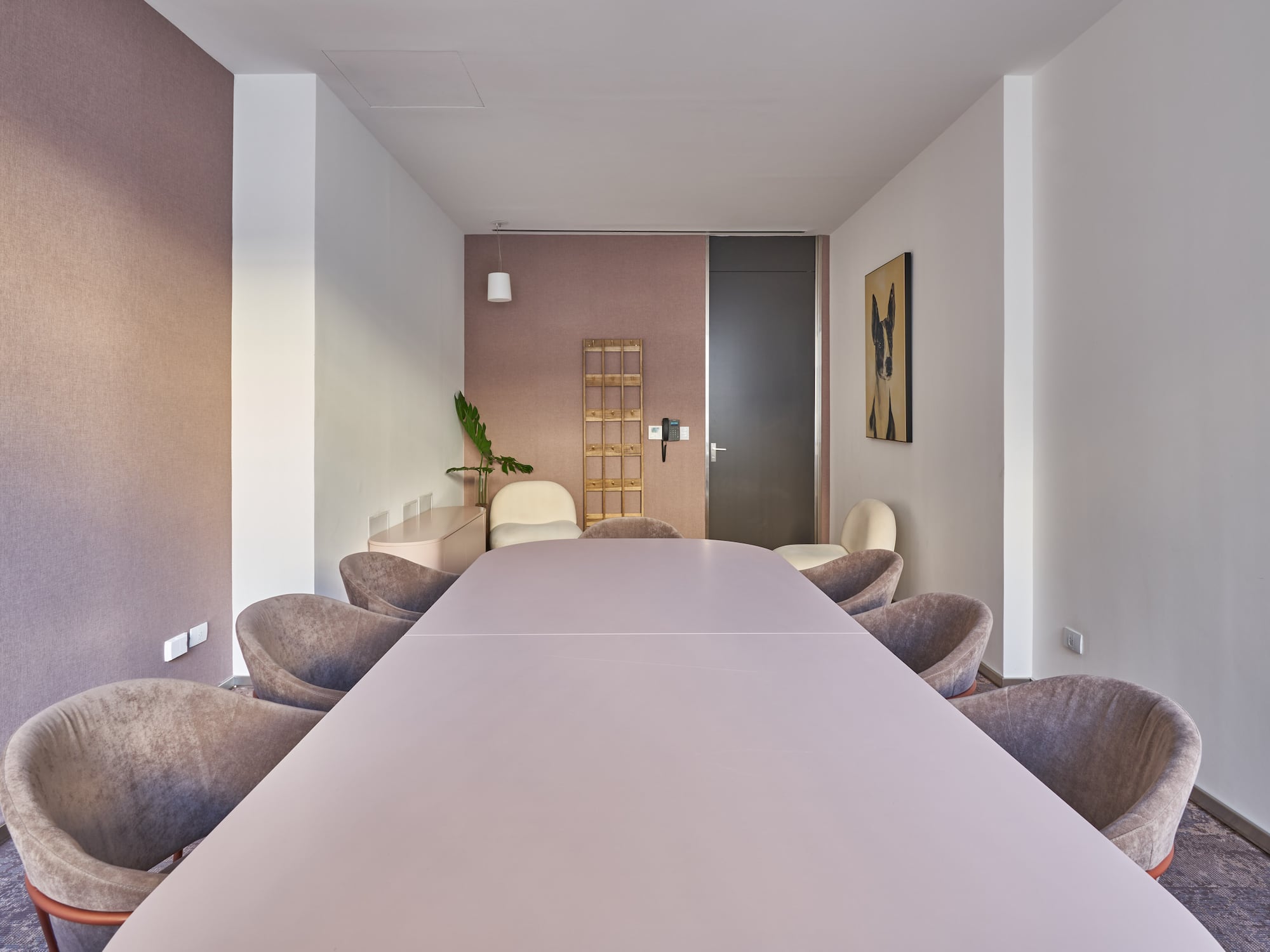 a room with a table and chairs