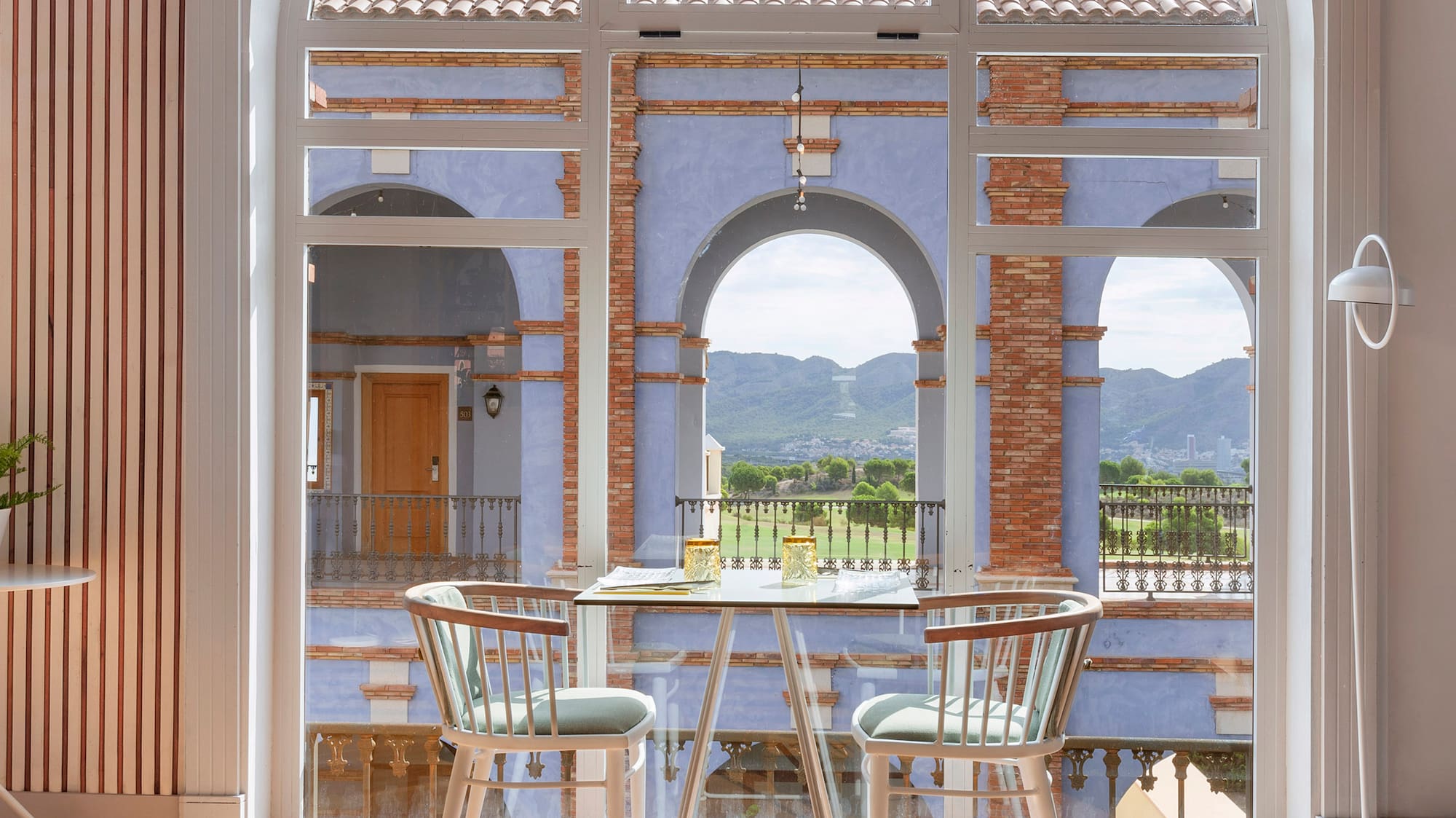 a room with a table and chairs