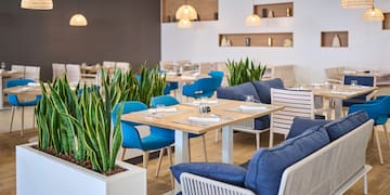 a room with tables and chairs