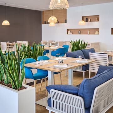 a room with tables and chairs