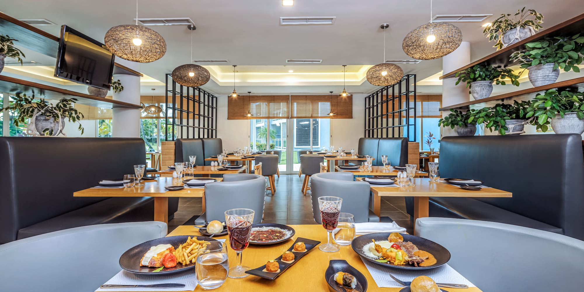 a restaurant with tables and chairs