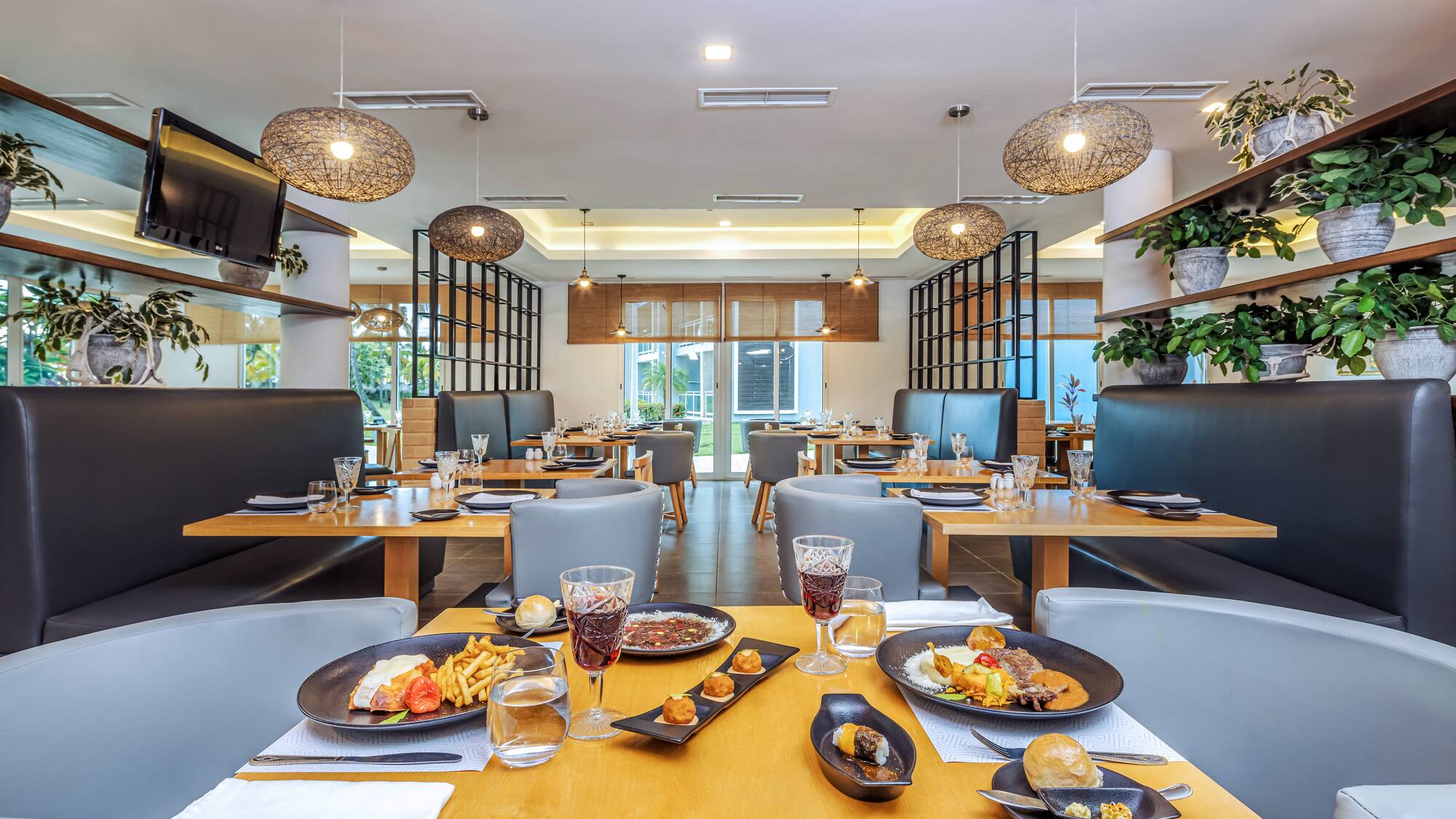 a restaurant with tables and chairs