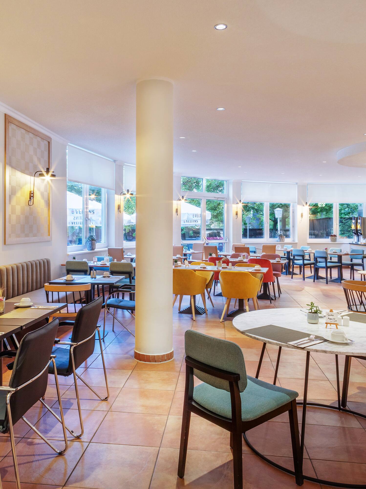 a restaurant with tables and chairs