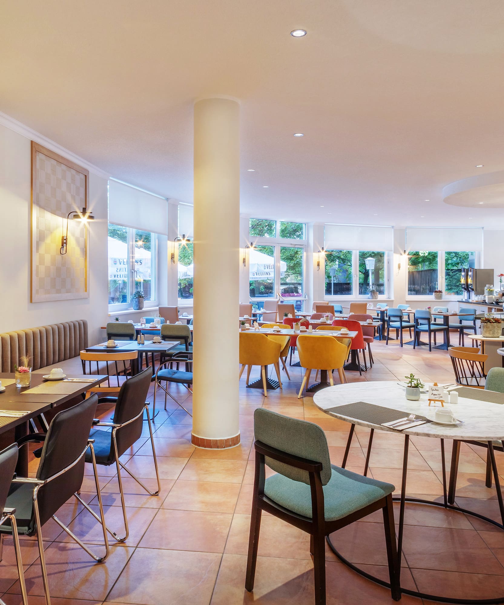 a restaurant with tables and chairs