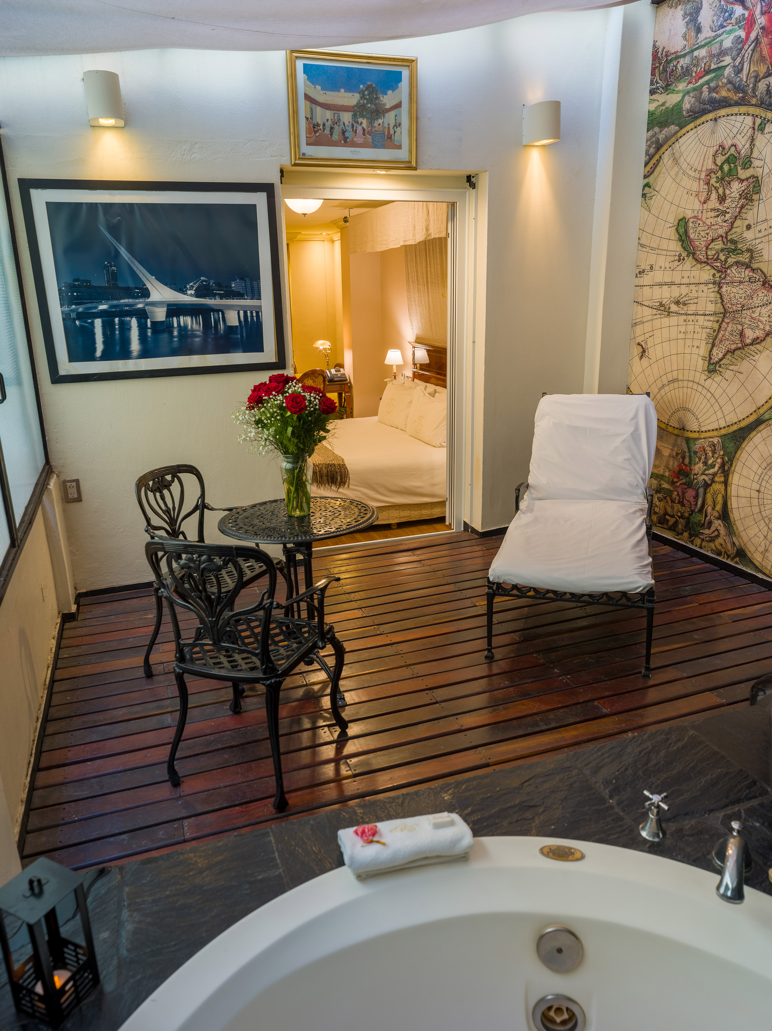 a room with a bathtub and a chair