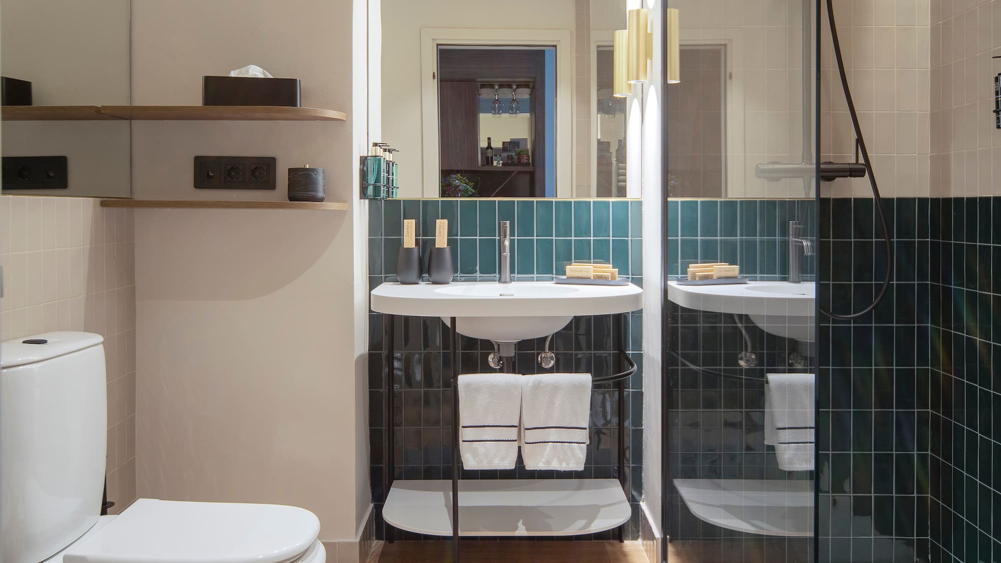 a bathroom with a glass shower door
