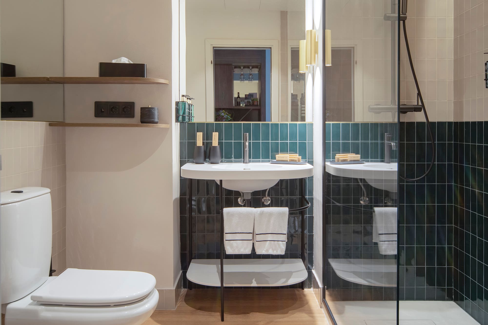 a bathroom with a glass shower door