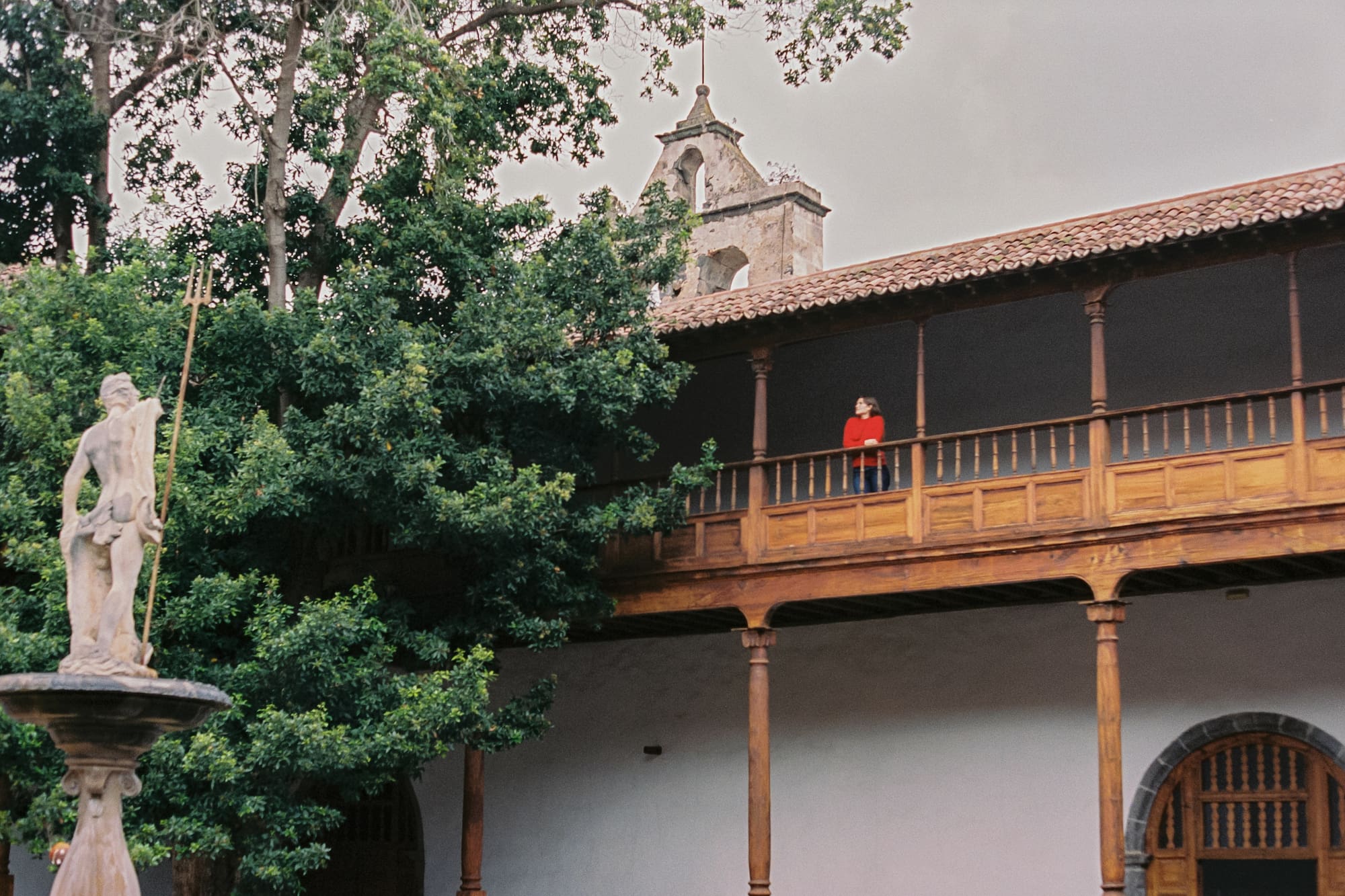 a person standing on a balcony