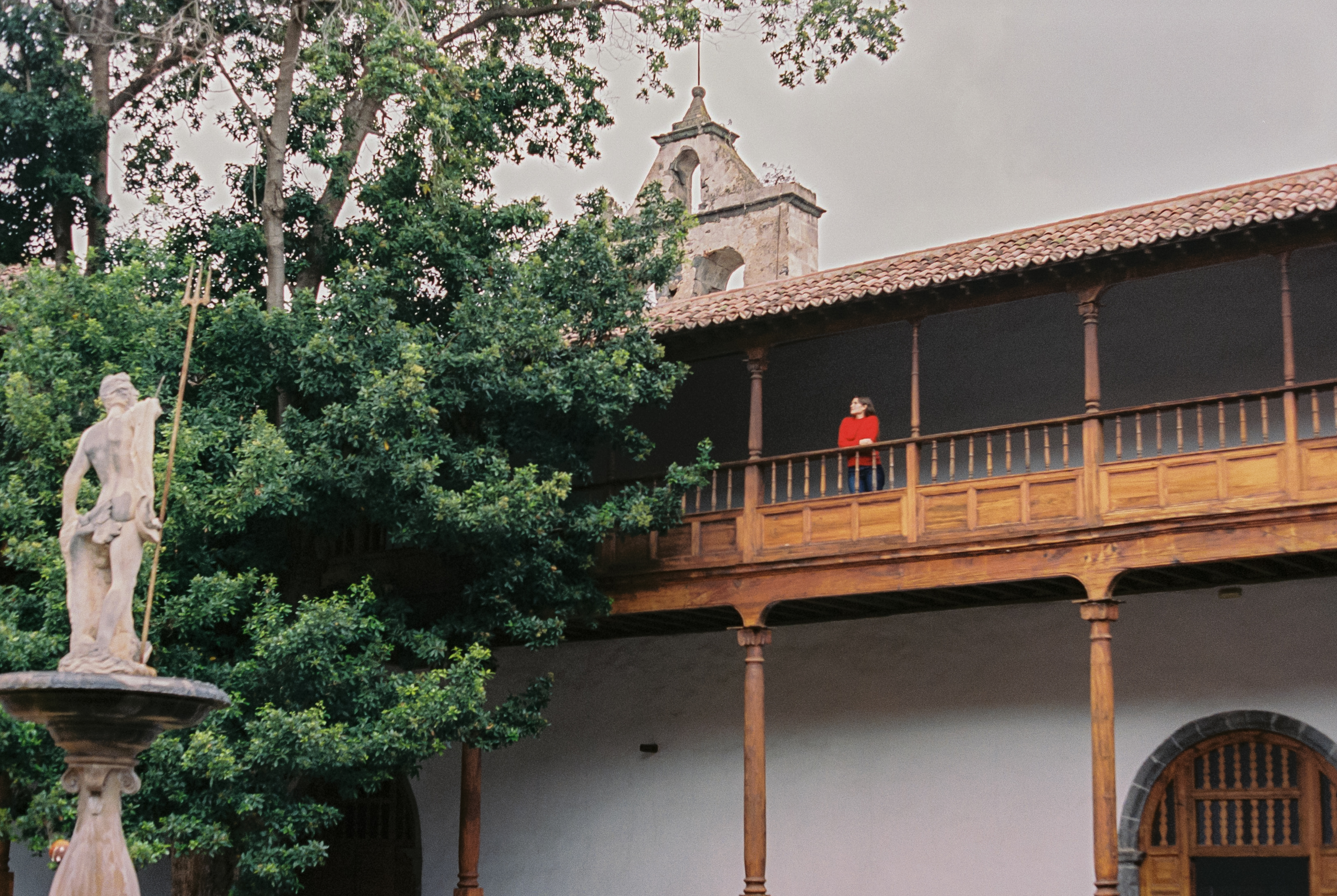 a person standing on a balcony