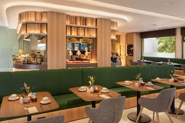 a restaurant with tables and chairs