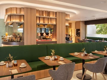 a restaurant with tables and chairs