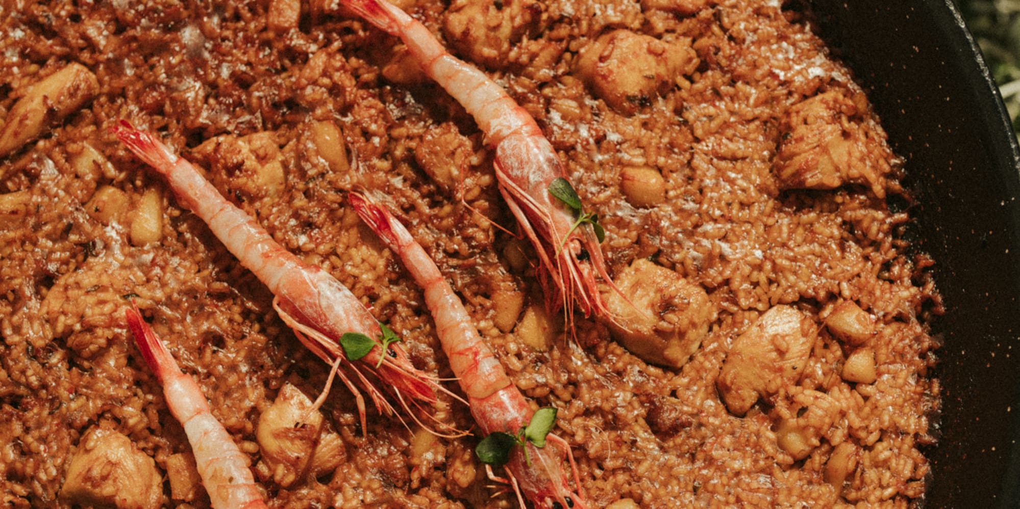 a pan of food with shrimps