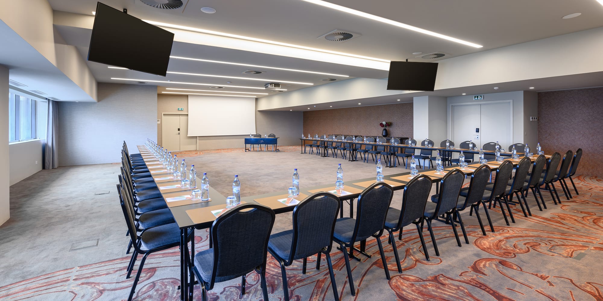 a room with tables and chairs