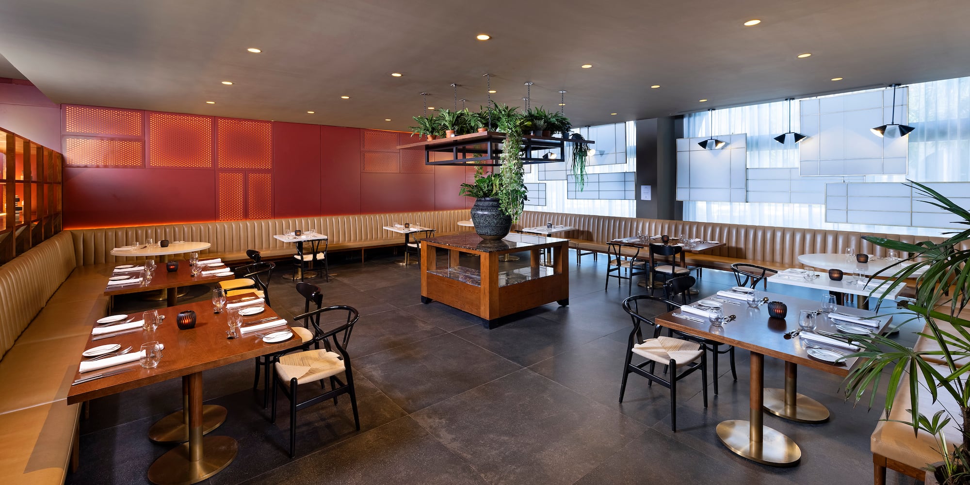 a restaurant with tables and chairs