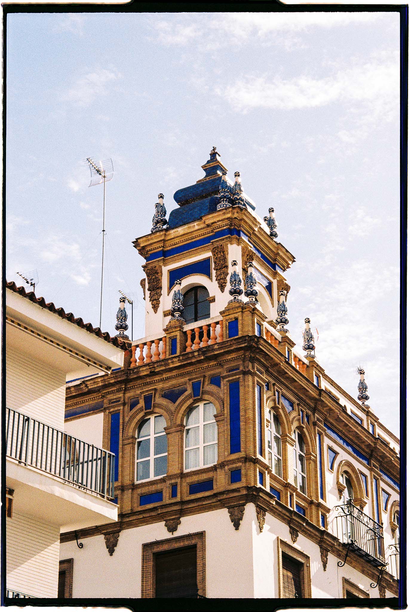 a building with blue and white trim