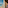 Resort balcony with ocean view, swimming pool, palm trees, and deck chair.