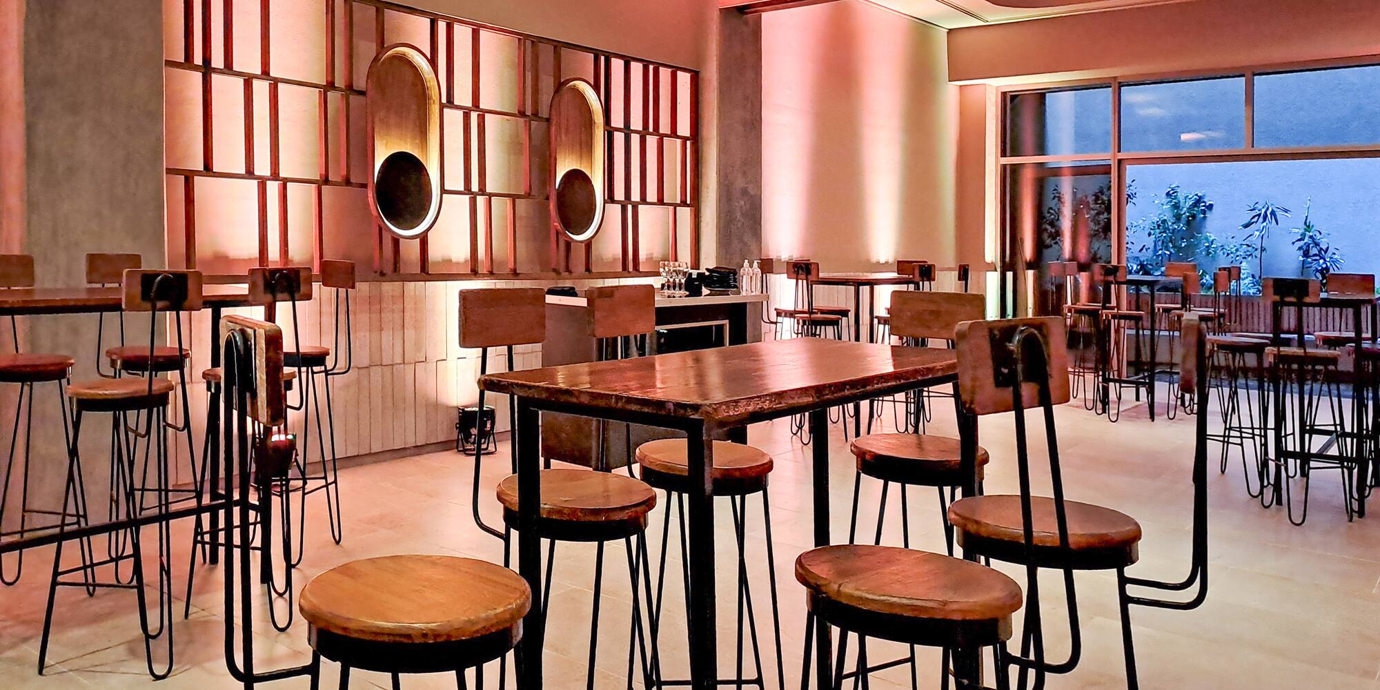 a room with tables and chairs