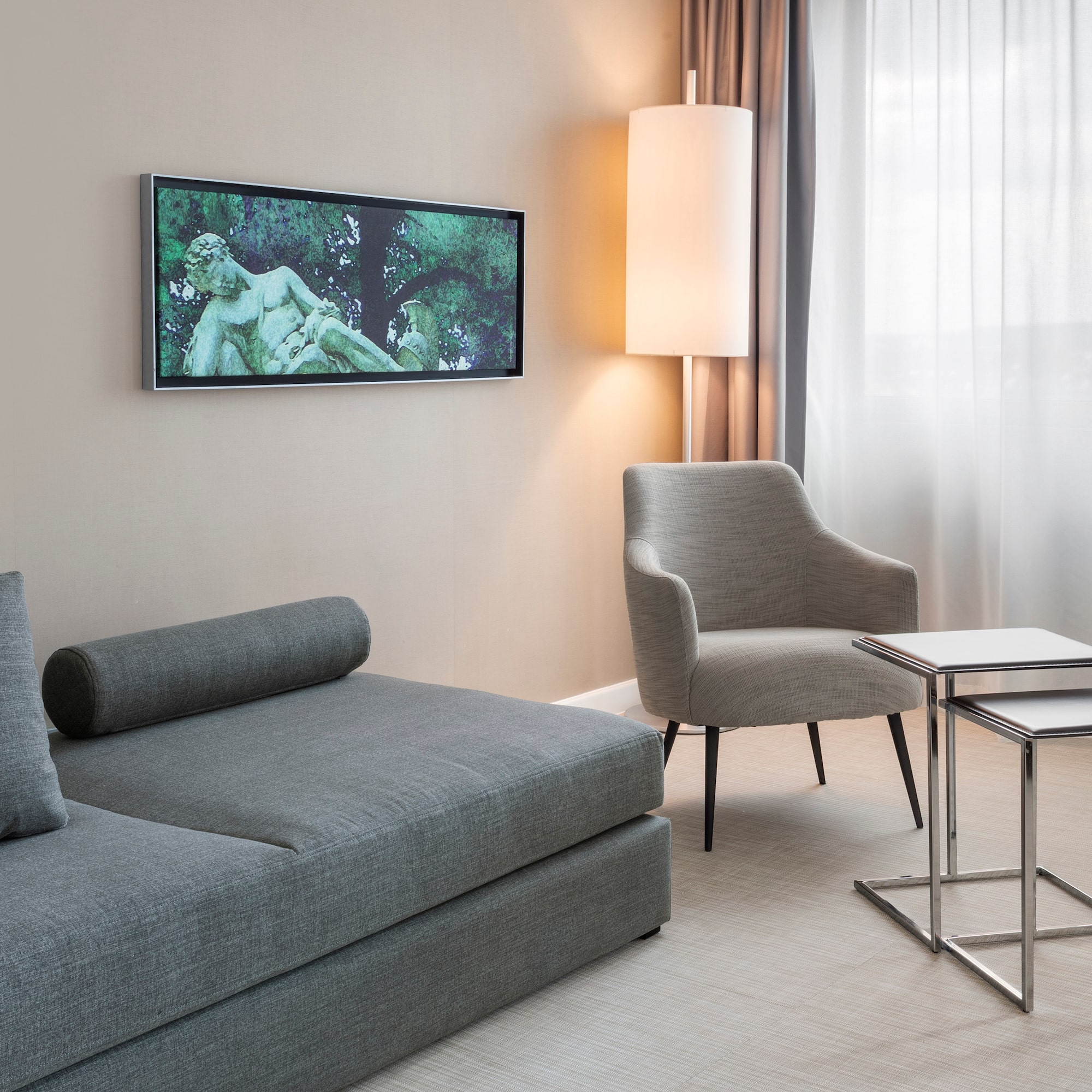 a living room with a couch and a tv