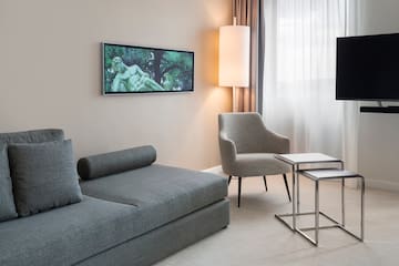 a living room with a couch and a tv
