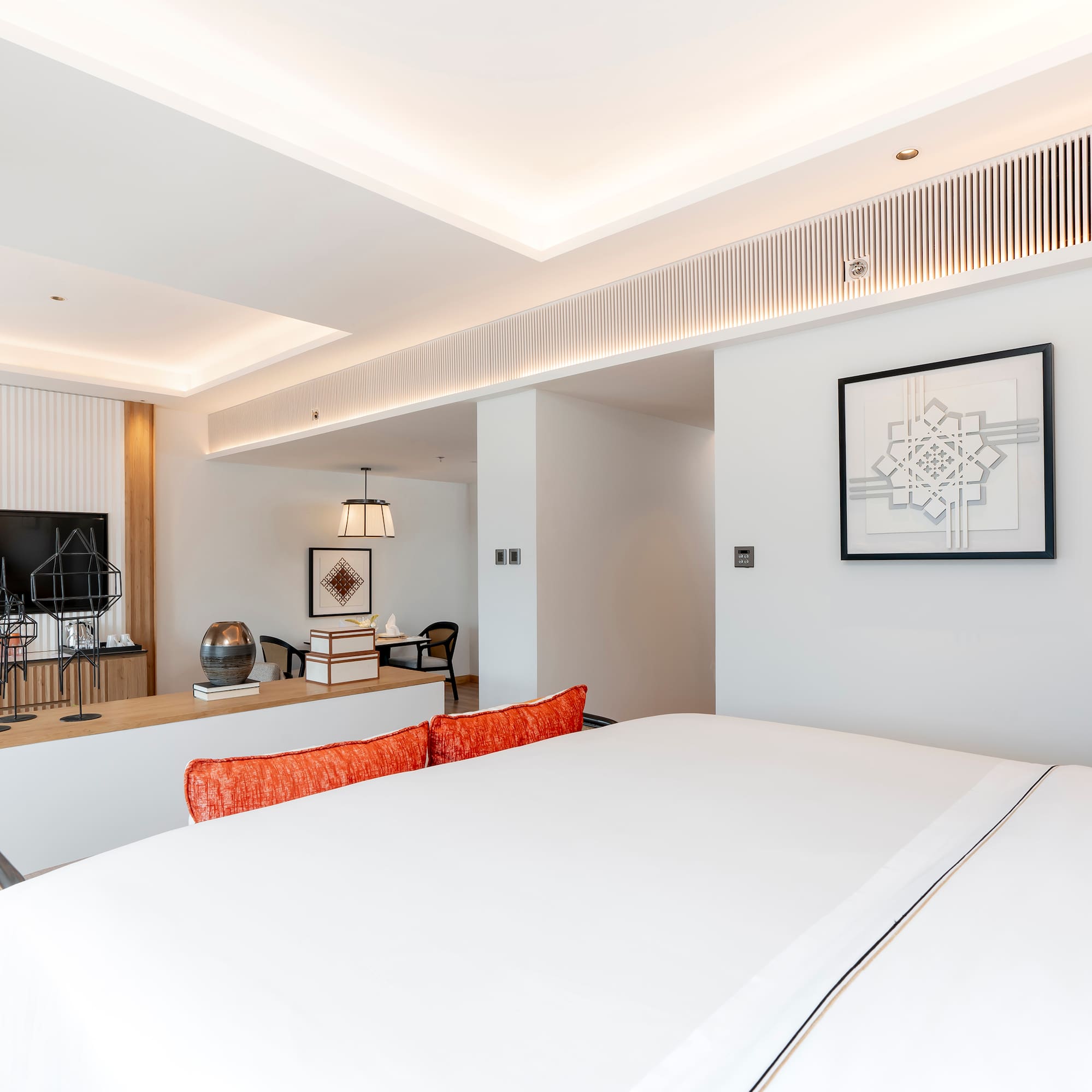 a room with a bed and a desk