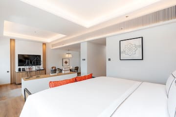 a room with a bed and a desk