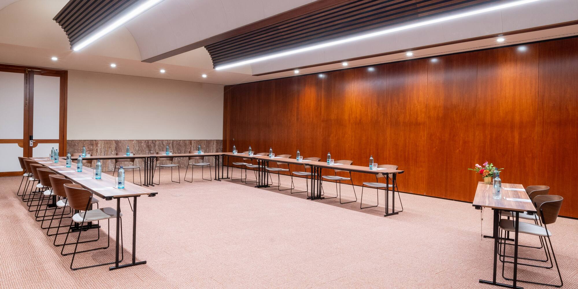 a room with tables and chairs