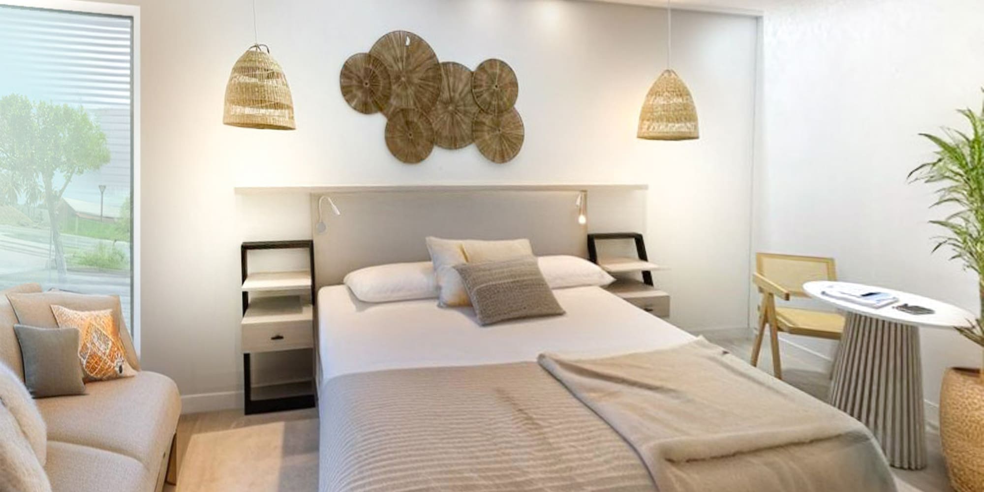 a room with a bed and a fan