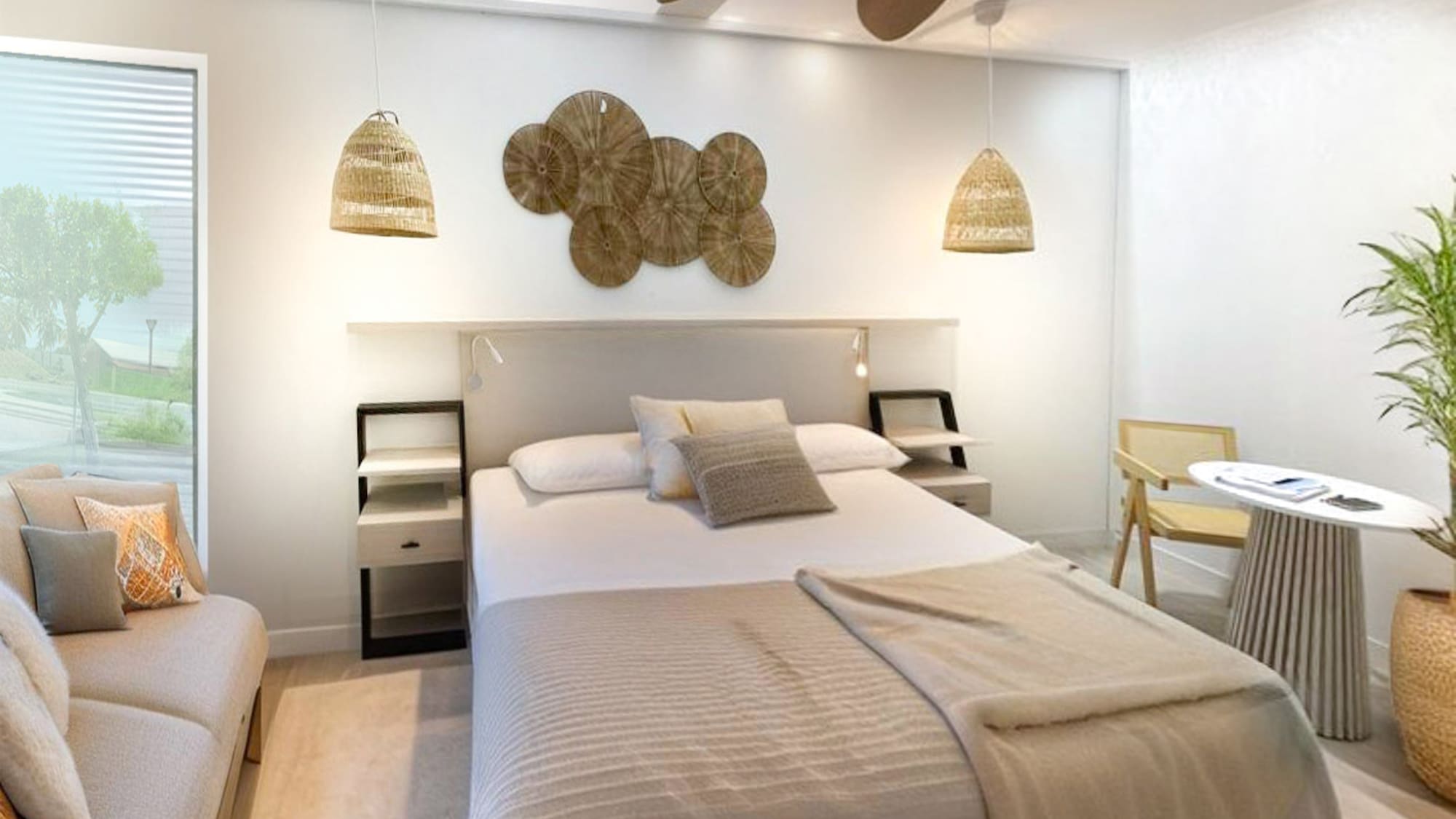 a room with a bed and a fan