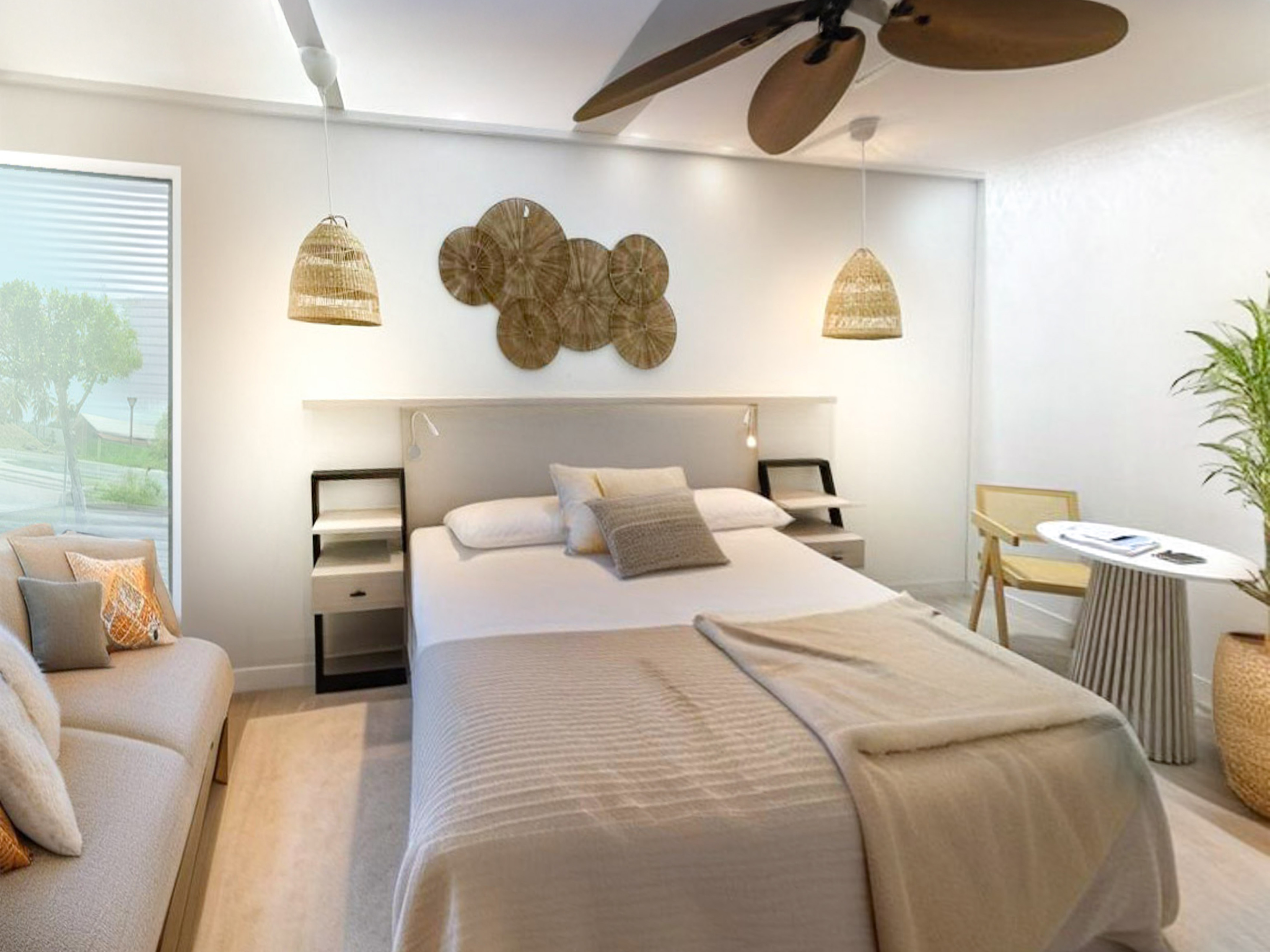 a room with a bed and a fan