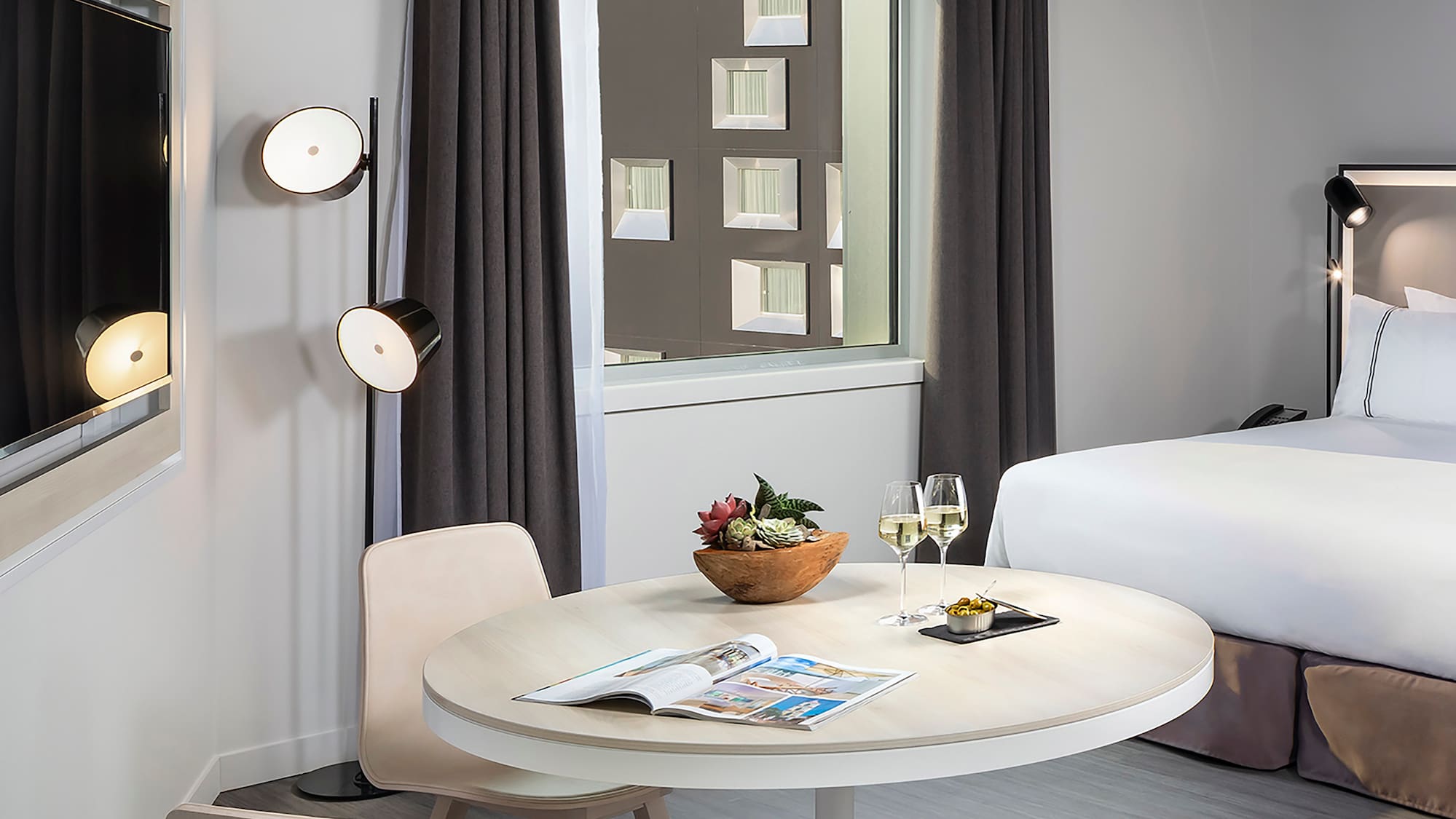 a room with a bed and a table