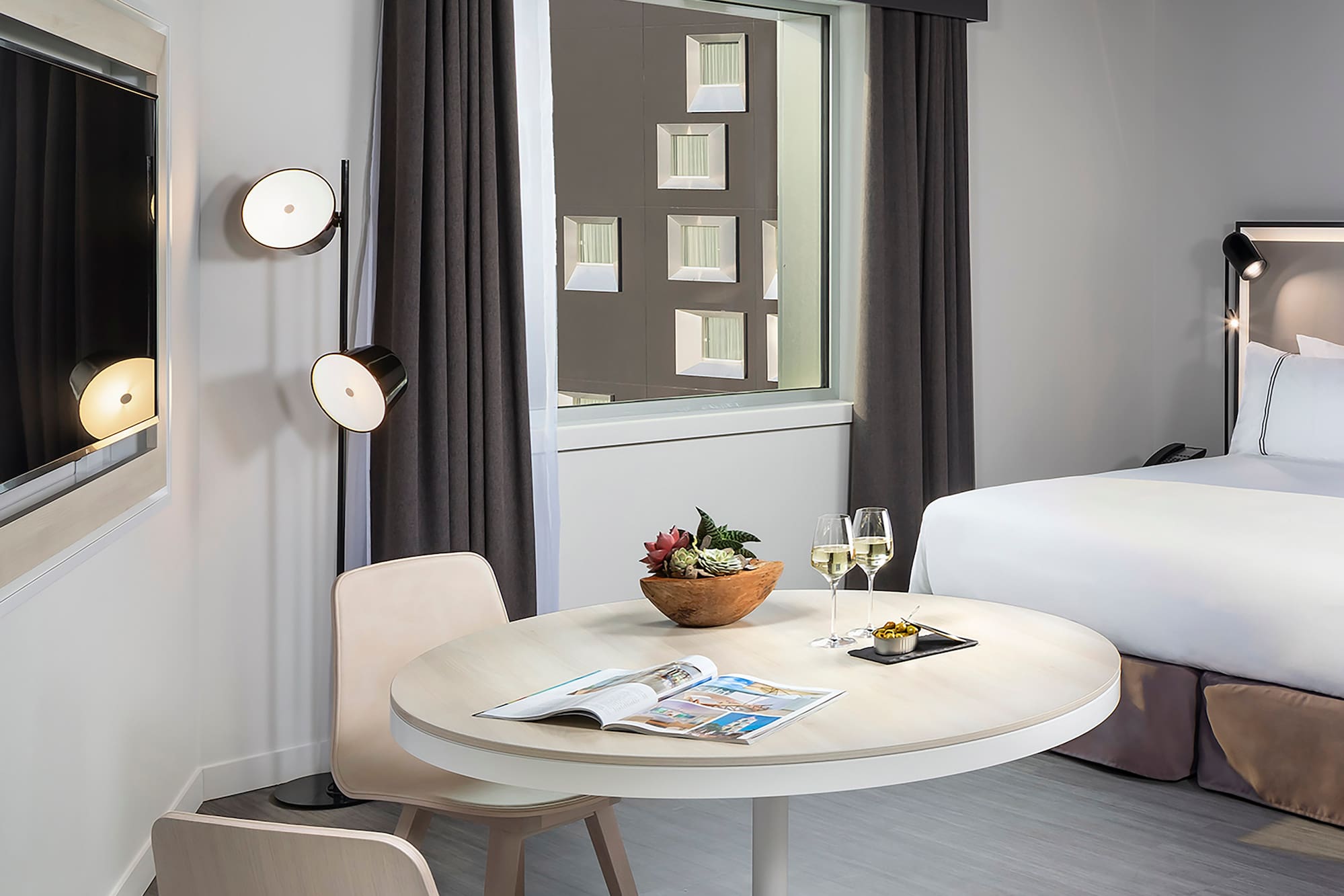 a room with a bed and a table