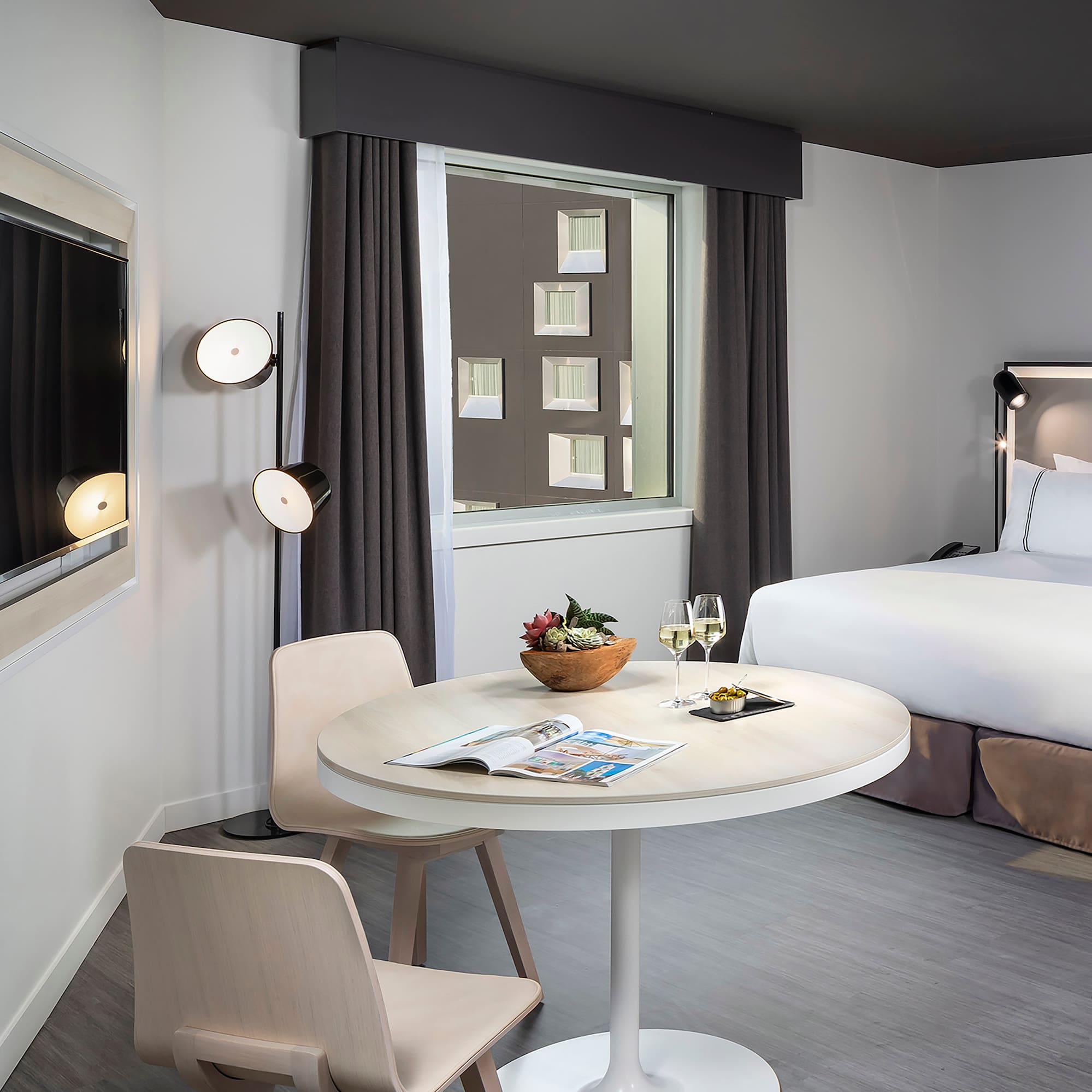 a room with a bed and a table