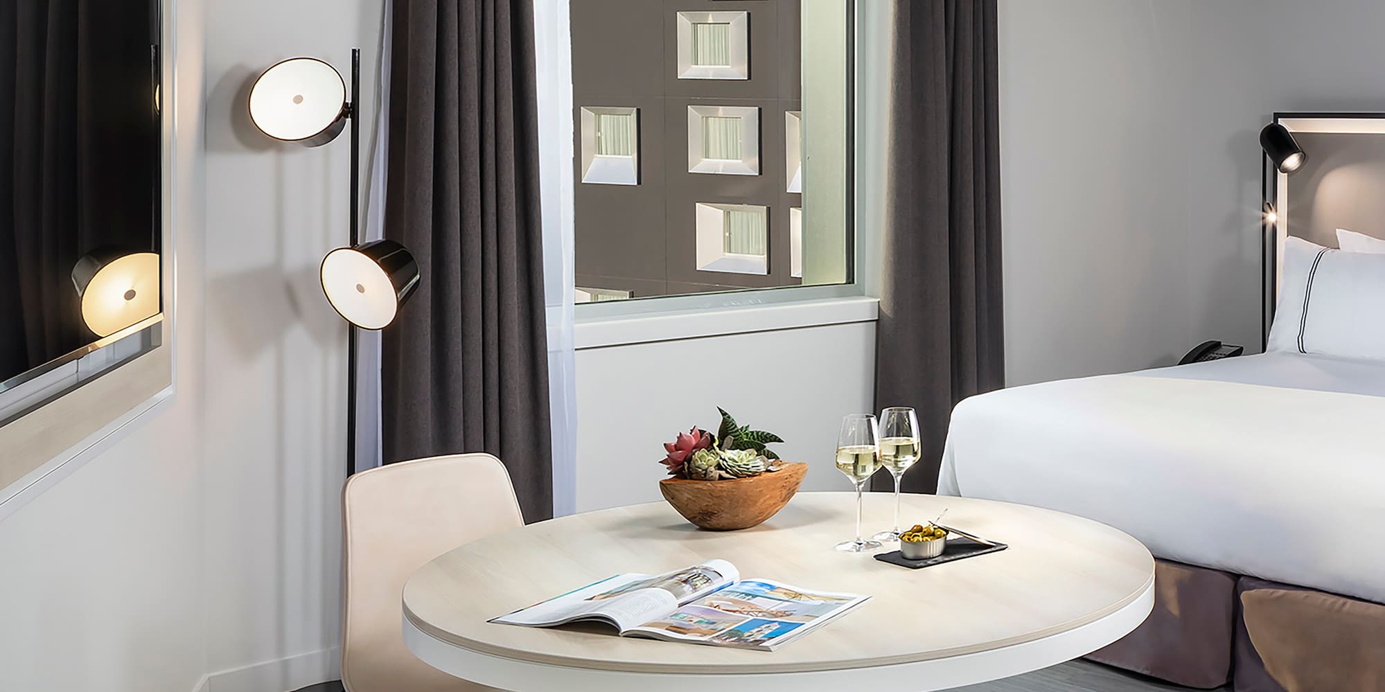 a room with a bed and a table