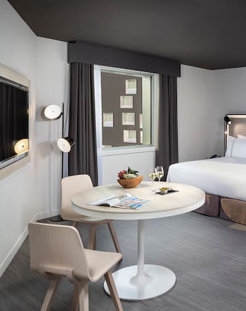 a room with a bed and a table