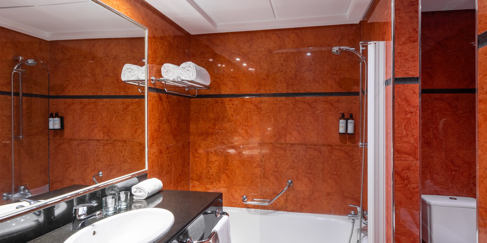 a bathroom with a sink and a shower