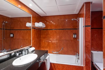 a bathroom with a sink and a shower