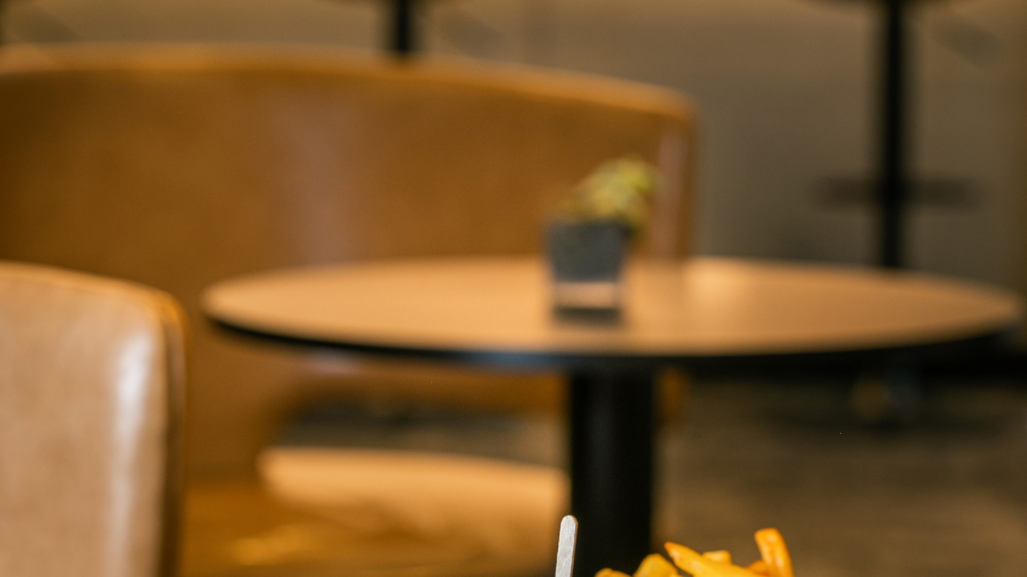a burger and fries on a table