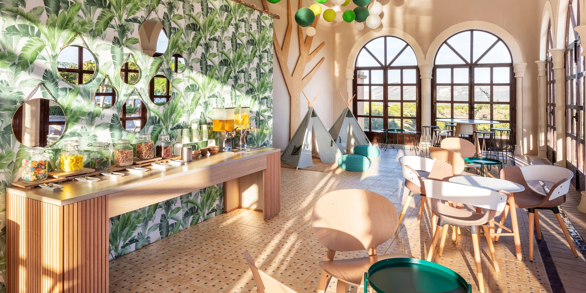 a room with tables and chairs and a tent