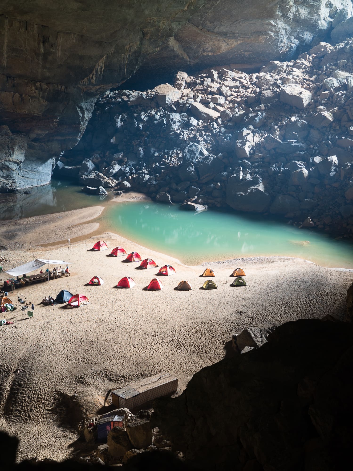 a group of tents on a beach