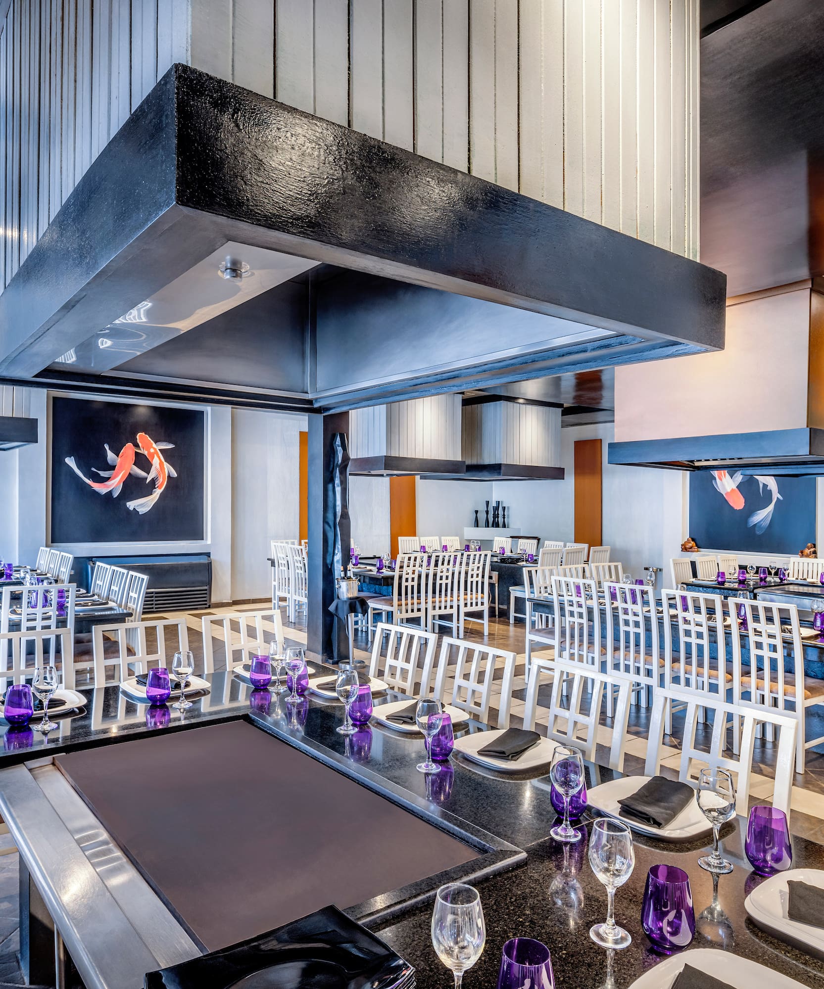 a restaurant with tables and chairs