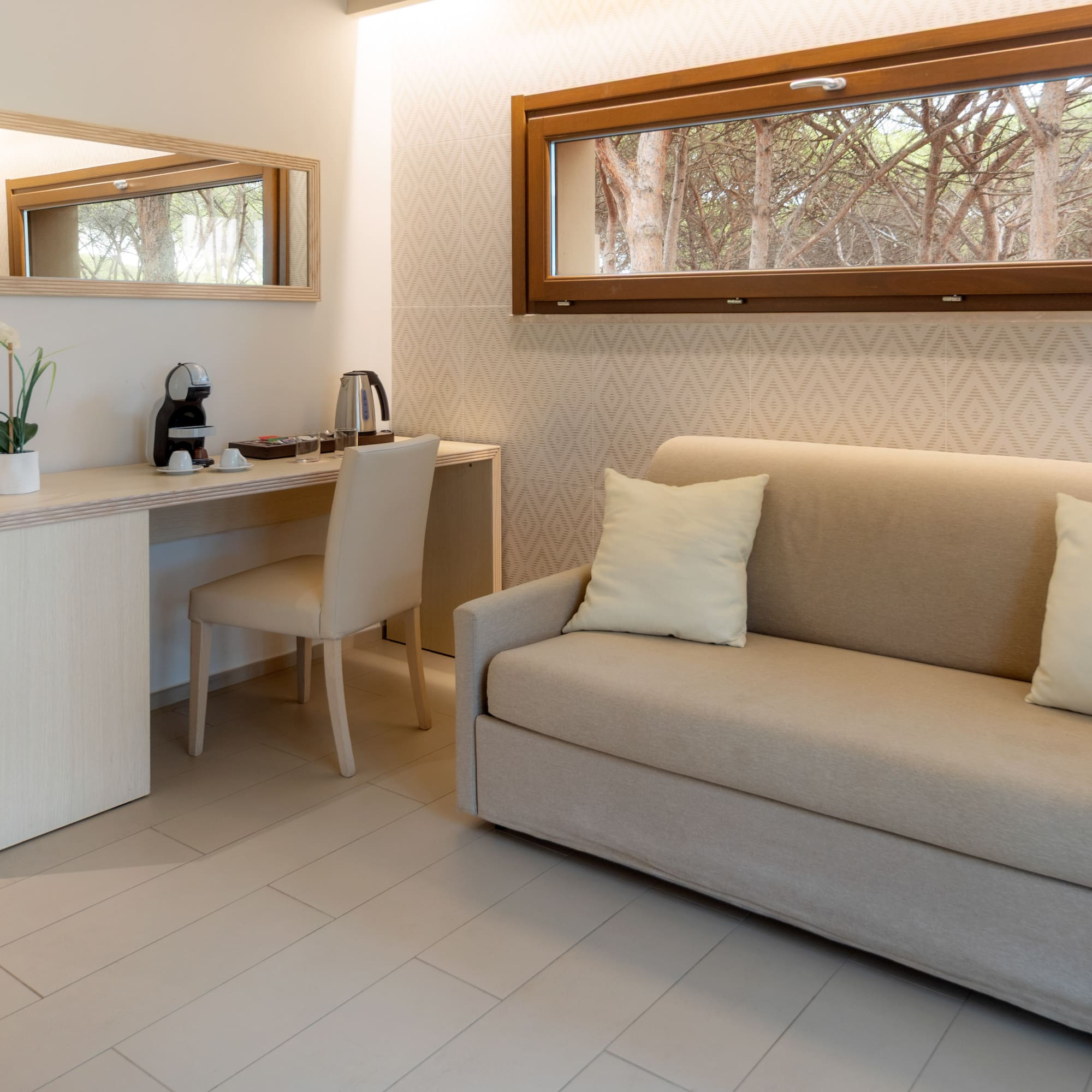 a room with a couch and a desk