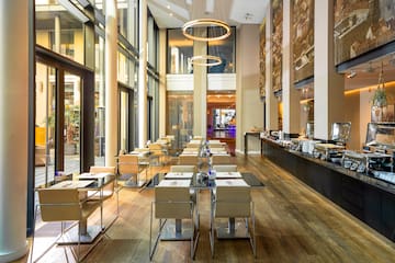 a restaurant with tables and chairs