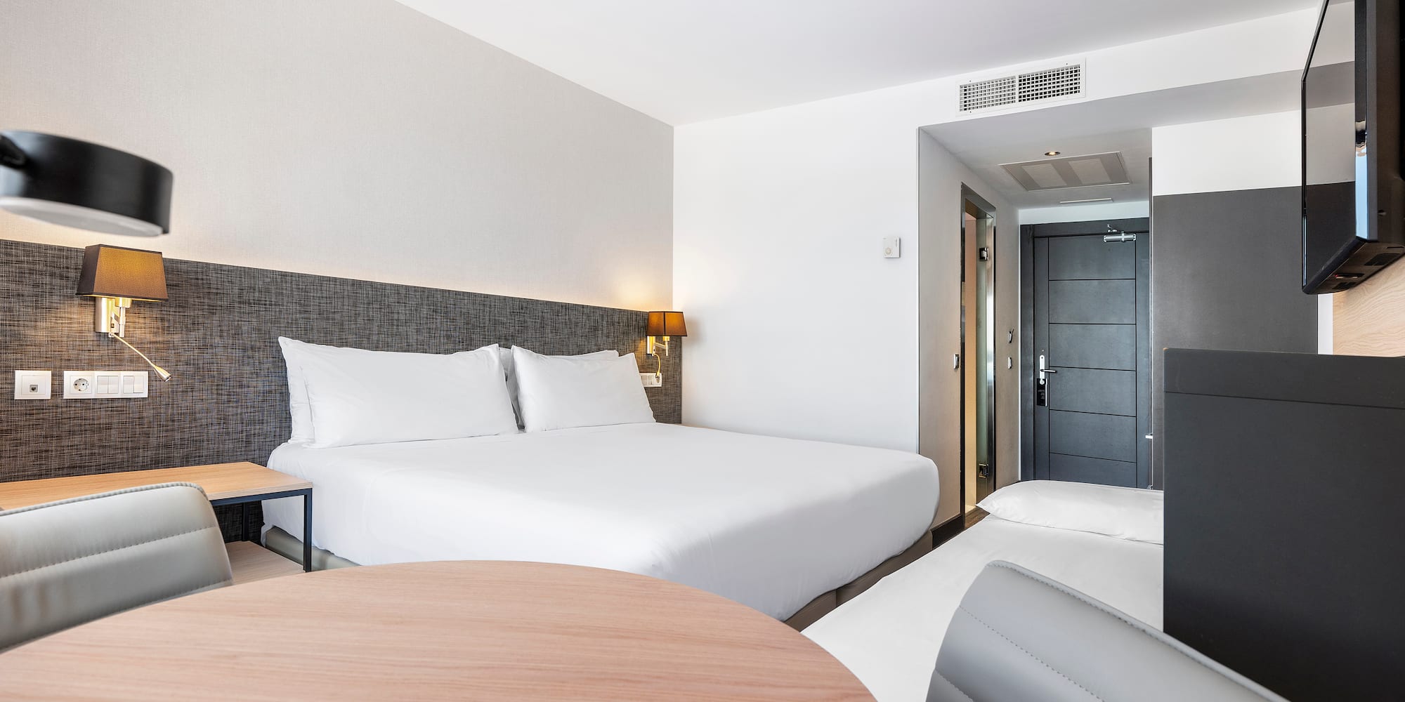 a room with a bed and a table